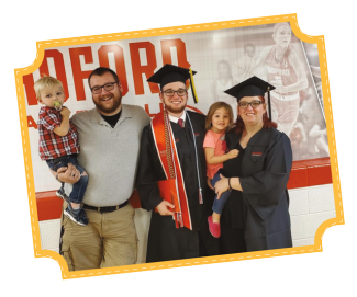 Trish Austin '19 and Noah Austin '19 pose for graduation photos with their family.